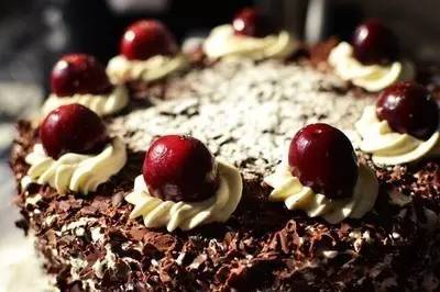 "Decadent Black Forest Cheesecake: A Symphony of Chocolate, Cherries, and Cream"
