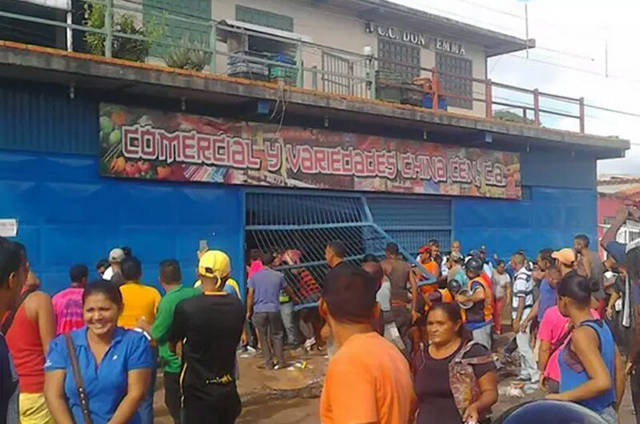 委内瑞拉货币改革引发骚乱 华人店铺遭哄抢