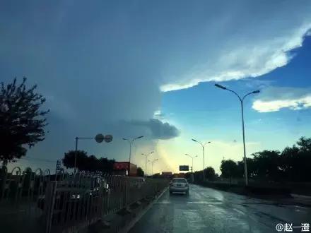 北京一半晴天一般下雨!还有双彩虹!