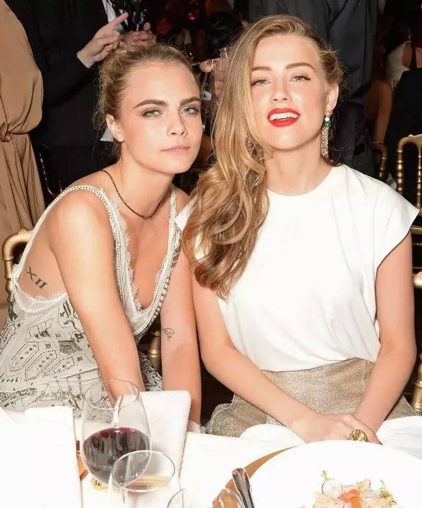 卡抽cara delevingne & 德普前妻amber heard偶尔