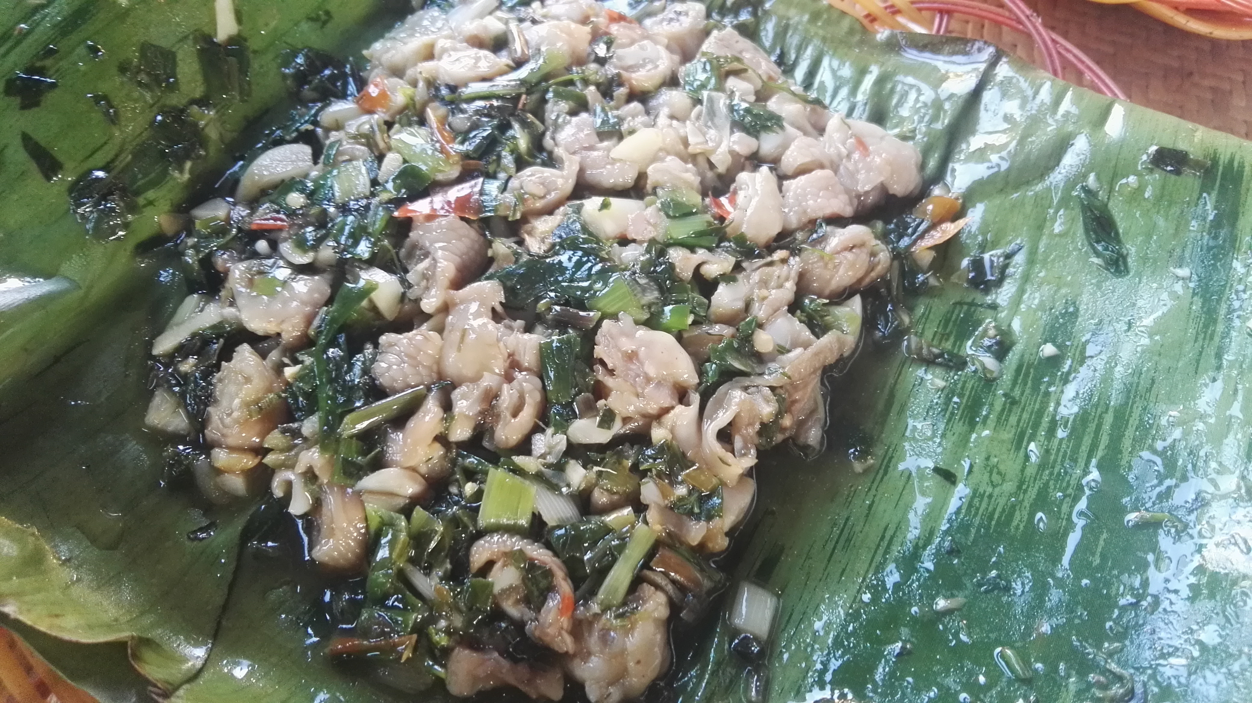 所谓包烧,是西双版纳傣族特殊的一种烹饪食品的方法.