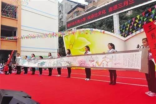 感受壮乡风情共享民族盛宴 南宁市中小学亚新体育开展形式多样的“三月三”主题活动(图4)