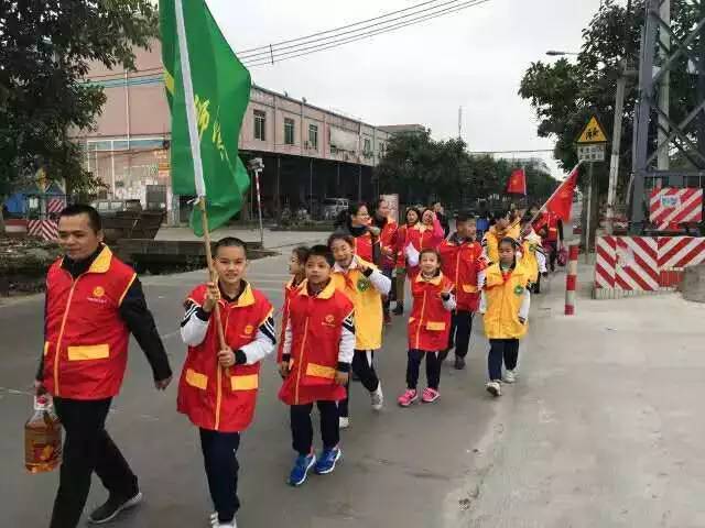 春风送暖,爱心送情 ——狮山联和吴汉小学"弘扬雷锋精神,爱心服务社会