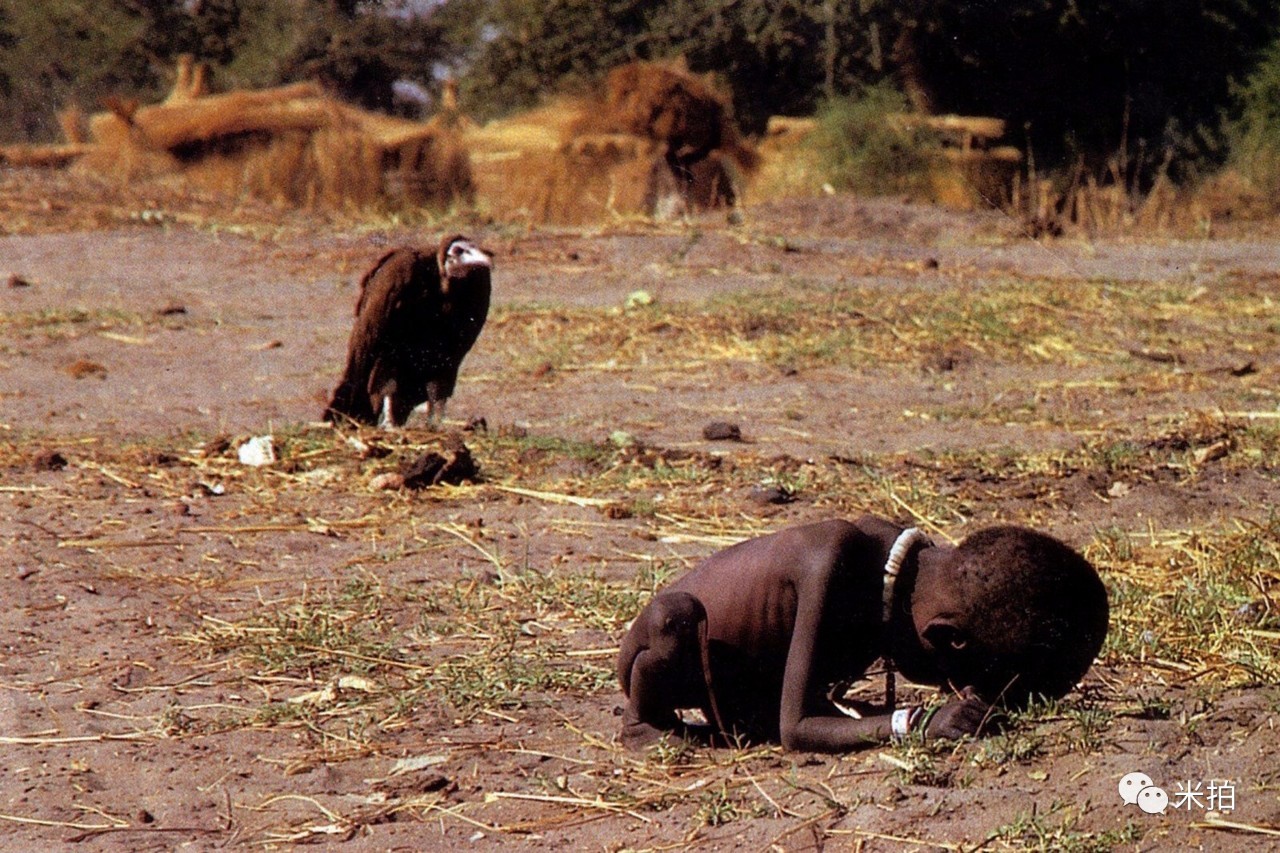 凯文·卡特(kevin carter)在拍照现场 凯文·卡特是南非的一位摄影师