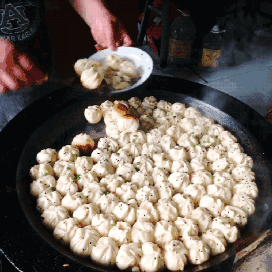 生煎包是湖州的一种传统特色小吃 家喻户晓留情千万 大街小巷 生煎
