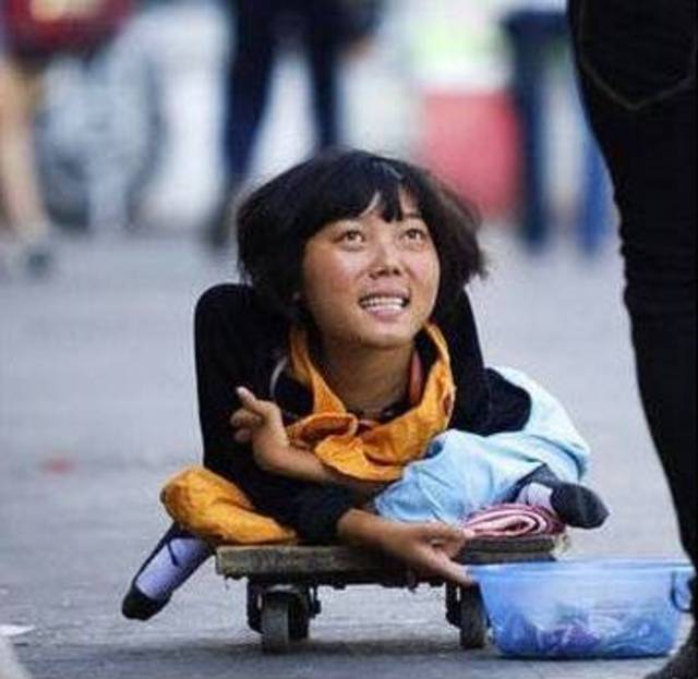 残疾小孩乞丐图片图片