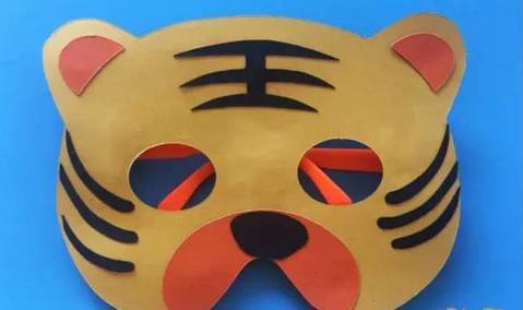 这个老虎面具是不是很可爱呢?小朋友想知道它是怎么制作的吗?