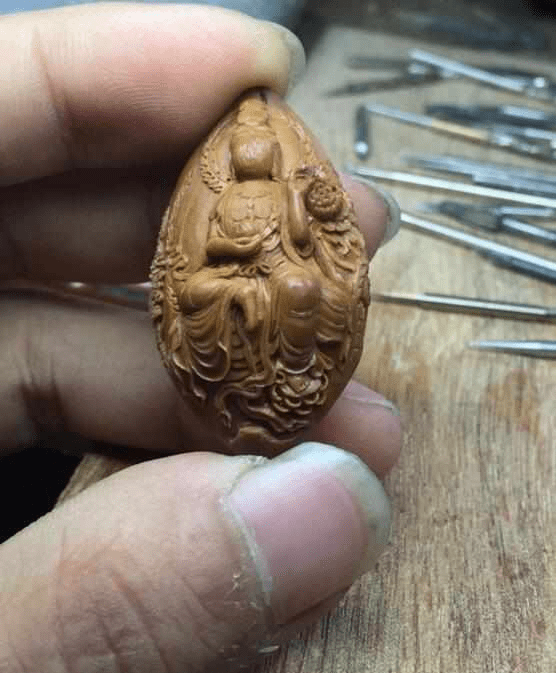 橄榄核雕刻大师一木图片